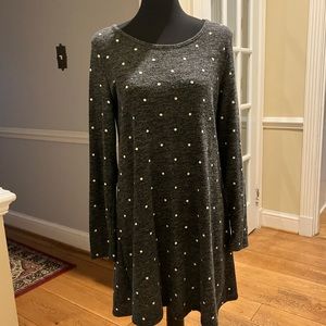 Cute and comfy sweater dress with suede elbow patch details.